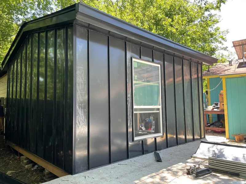 Black standing seam metal wall panels for Metal Roof Installation in Goldenrod