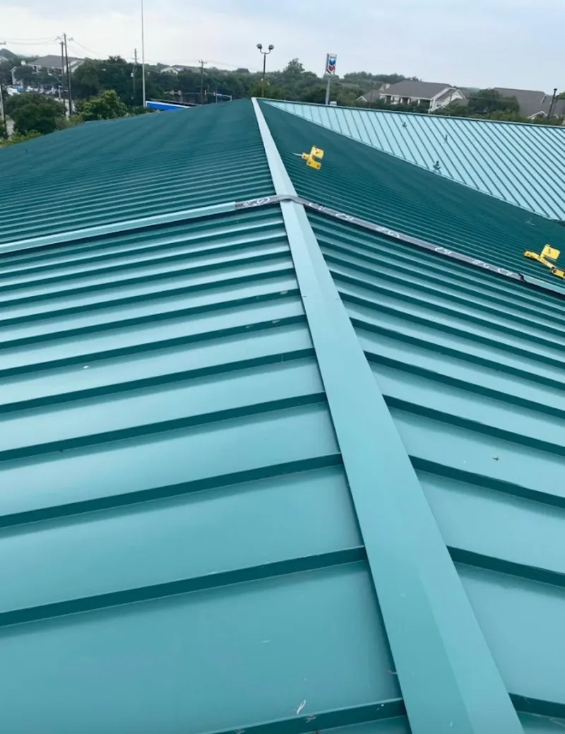 Green commercial metal roof ridge and valley for Metal Roof Repair in Goldenrod